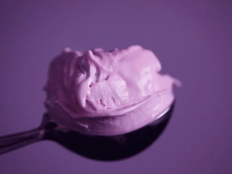 Purple ube ice cream in a bowl, showing the mainstream American adoption of Filipino purple yam
